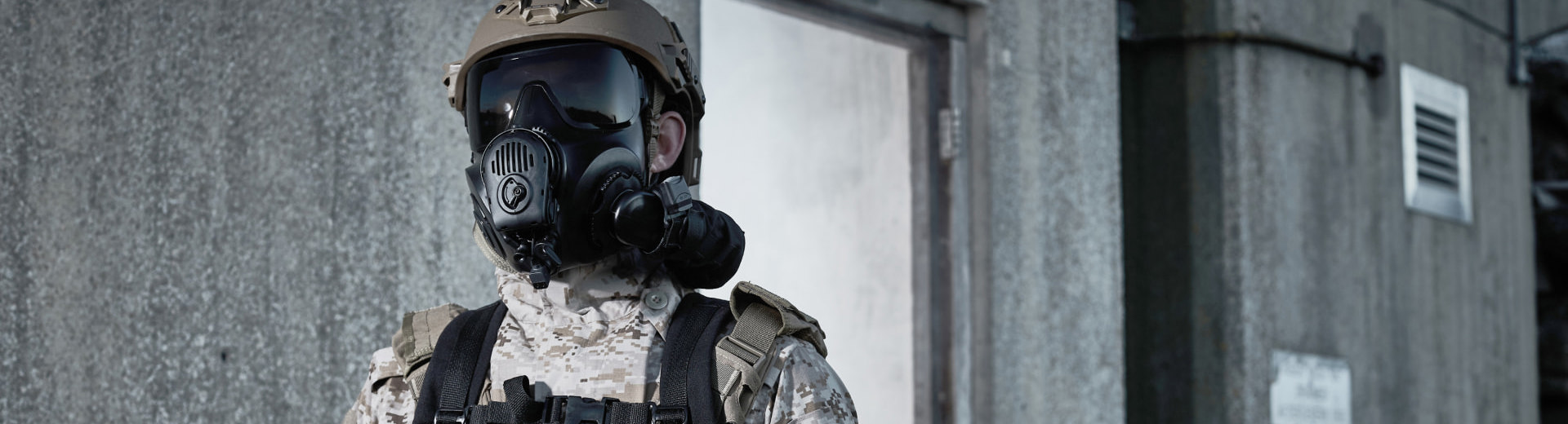 Soldier wearing a helmet and respirator