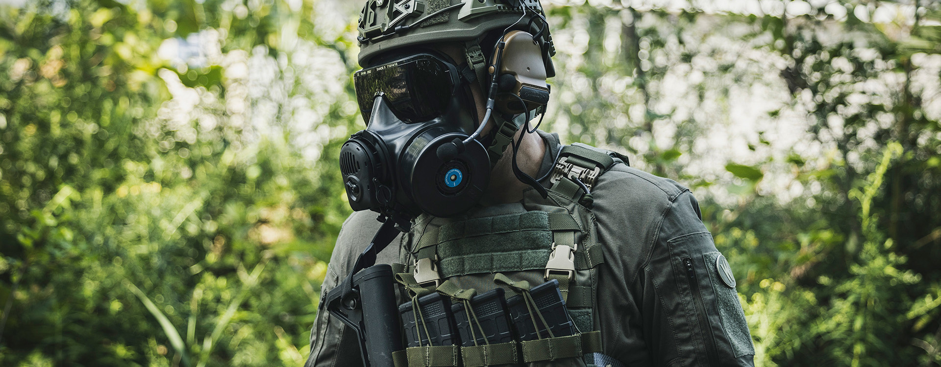 Soldier in helmet and respirator 
