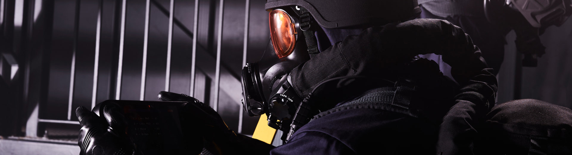 Soldier wearing a helmet and respirator