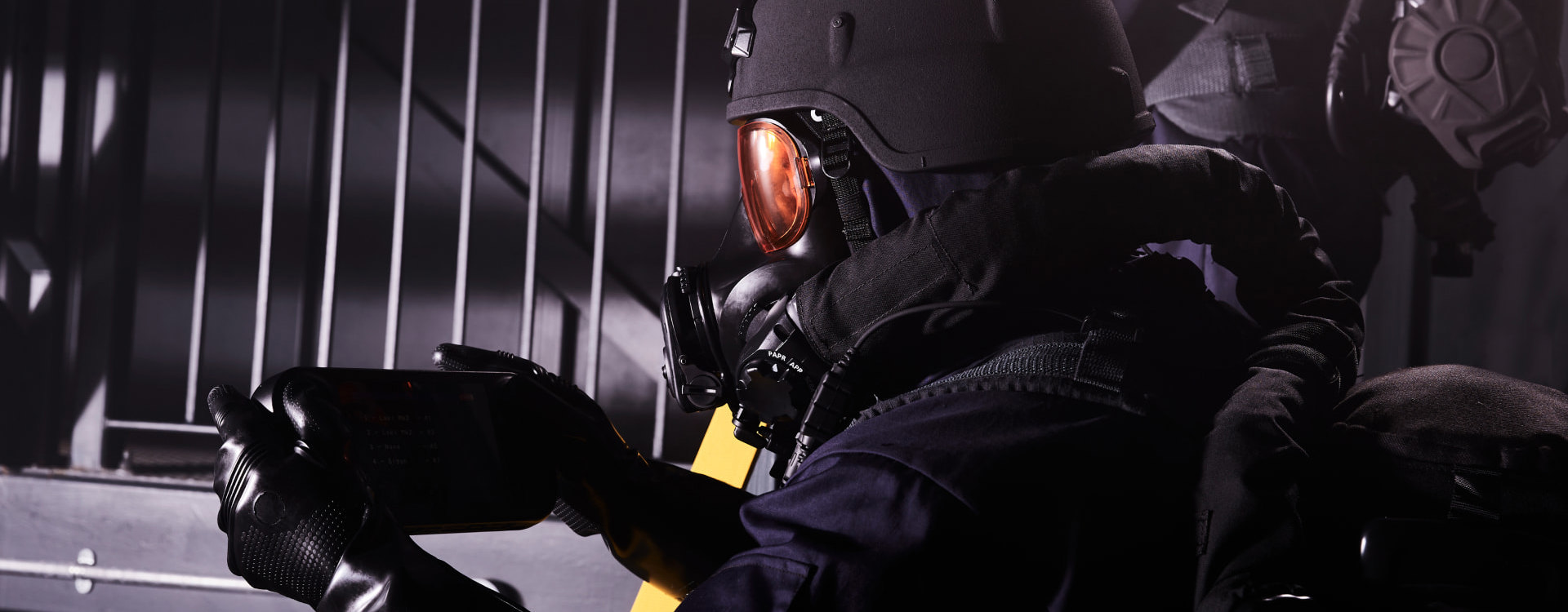 Soldier wearing a helmet and respirator