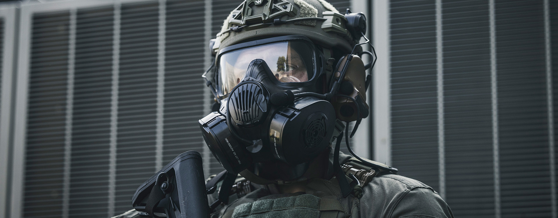 Soldier wearing a helmet and respirator
